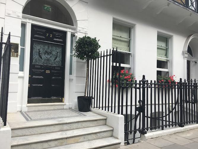 Dr. Issy Mahmood BDS (Lond)